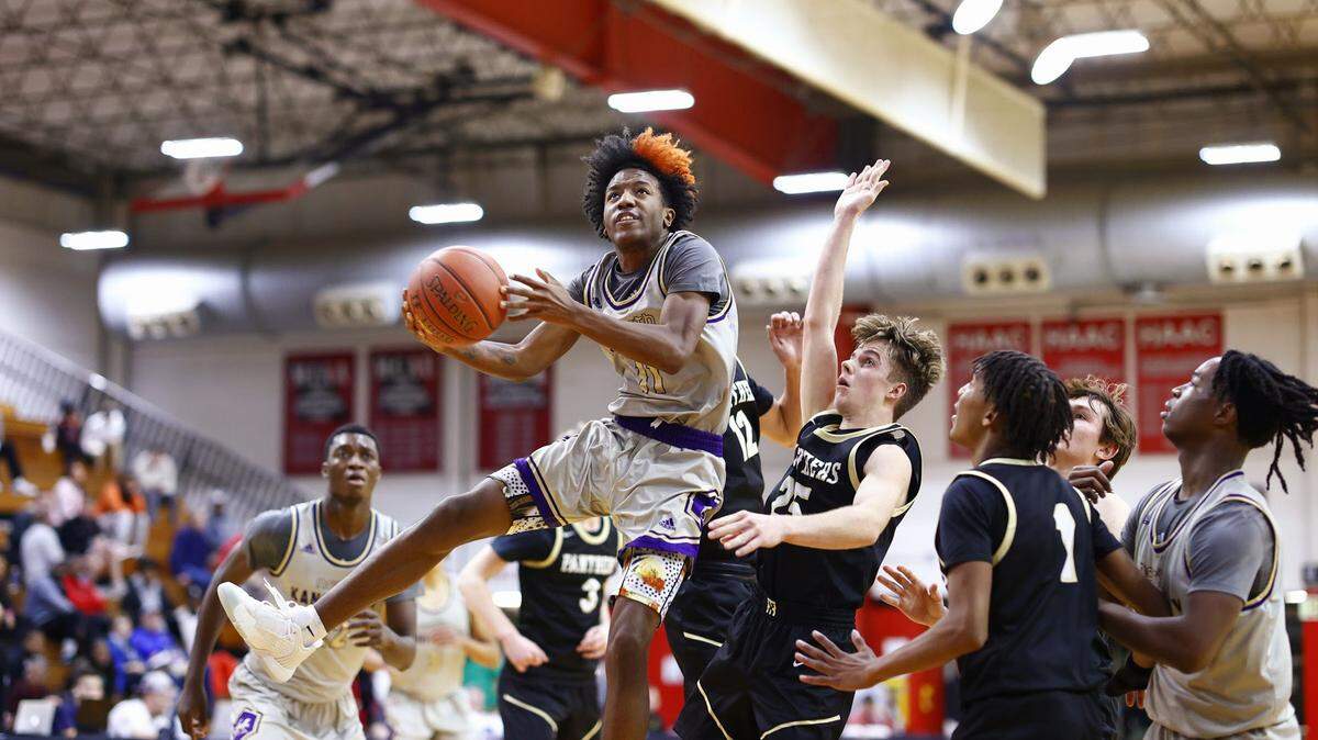 Kamron Tate goes up for two of his 10 points during North Kansas City’s 56-51 win in Friday night’s semifinals at the William Jewell Holiday Classic in Liberty.