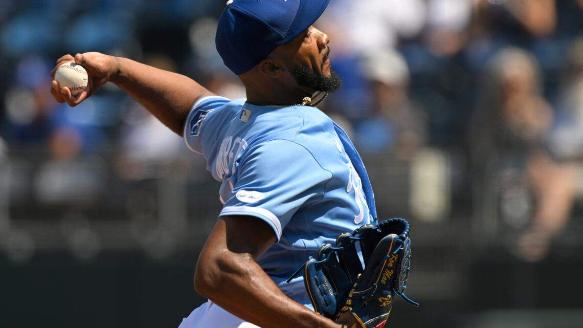 Kansas City Royals relief pitcher Amir Garrett throws to a Los Angeles Dodgers batter during the seventh inning of a baseball game, Sunday, Aug. 14, 2022, in Kansas City, Mo. (AP Photo/Reed Hoffmann)