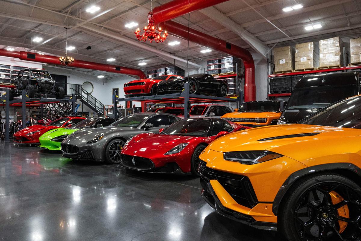 Playfully called Strange Box, this building is a “toy box” featuring top of the line sports cars, ATV’s, and a bike repair shop. The building is one of many on the Strange Land compound, a site that serves as HQ for Strange Music.