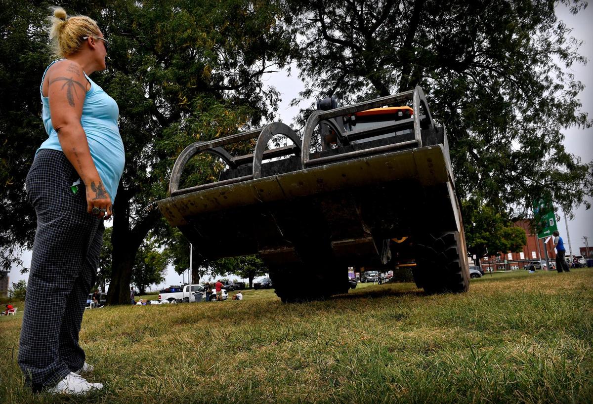 After tearing down her tent and quickly packing what belongings she could, Lulu Livingston, the leader of an encampment of about two dozen homeless people, stood defiantly in front of a massive front loader, while taking exception with the amount of force being shown by the Kansas City Parks & Recreation Department, and KCPD during a recent sweep of the camp. It’s criminalizing homelessness, she said. The driver of the front loader retreated to a spot across the street a short time later.