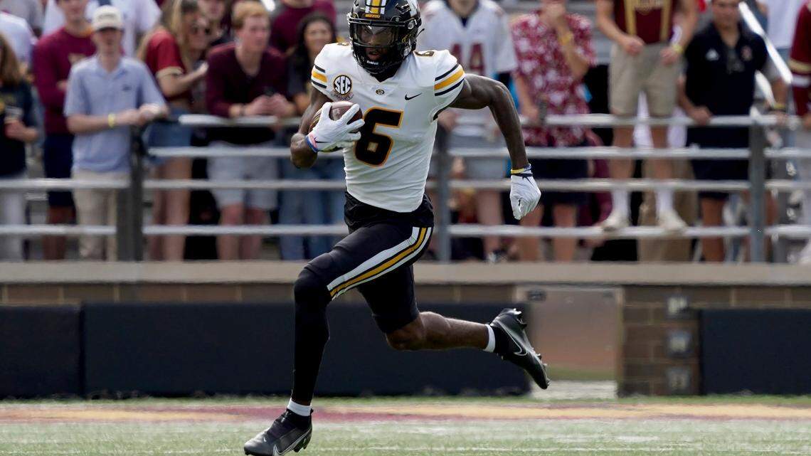 Missouri wide receiver Keke Chism (6) rushes with the ball during the first half of an NCAA college football game against Boston College, Saturday, Sept. 25, 2021, in Boston. (AP Photo/Mary Schwalm)