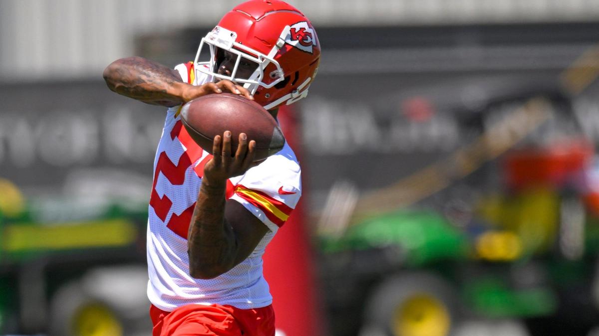 Kansas City Chiefs wide receiver Nikko Remigio (27) snags a pass and runs a drill during a Chiefs rookie mini camp practice on Sunday, May 7, 2023, in Kansas City.
