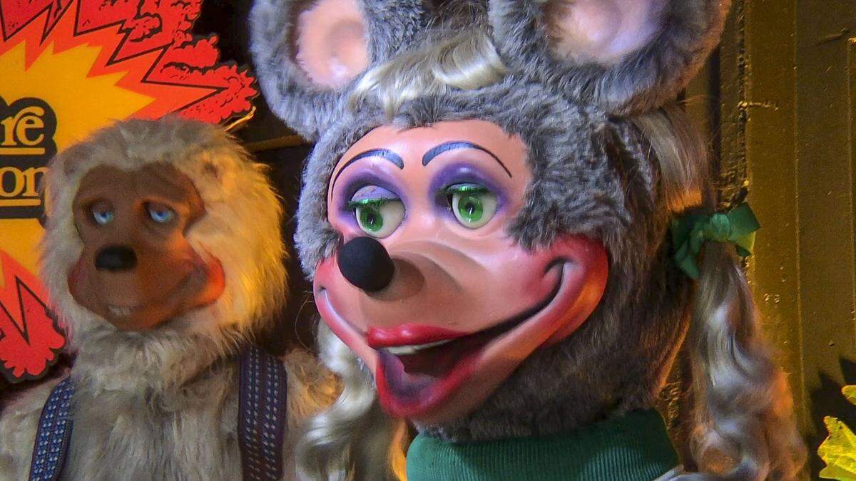 Mitzi Mozzarella, an animatronic mouse, performed at the short-lived Rock-afire Arcade Bar in Kansas City, which opened in 2018. Mitzi and the other members of the Rock-afire Explosion band were salvaged from a ShowBiz Pizza Place.