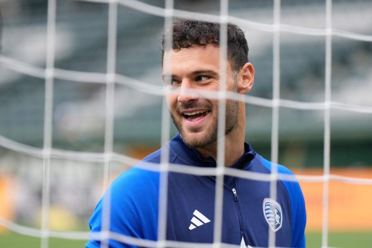 Sporting Kansas City goalkeeper John Pulskamp (1) warms up before a match against the Portland Timbers at Providence Park on May 25, 2024.