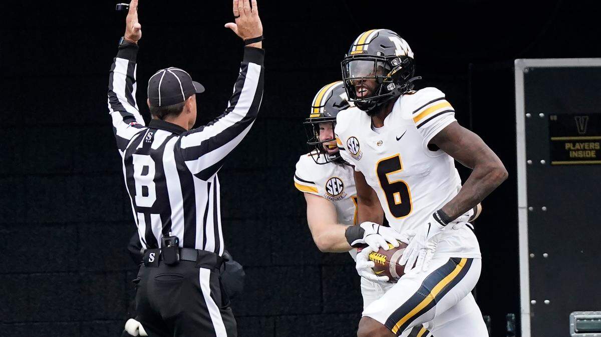 Missouri wide receiver Keke Chism (6) celebrates after catching a 45-yard touchdown pass against Vanderbilt as time expires in the second quarter of an NCAA college football game Saturday, Oct. 30, 2021, in Nashville, Tenn. (AP Photo/Mark Humphrey)