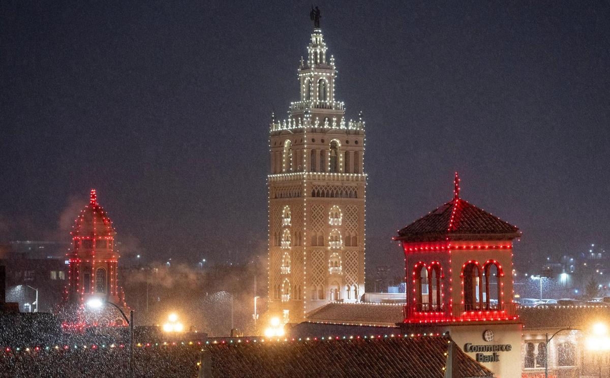 The Plaza Lights shine brightly as the season’s first snow falls on Saturday, Nov. 25, 2023, in Kansas City.