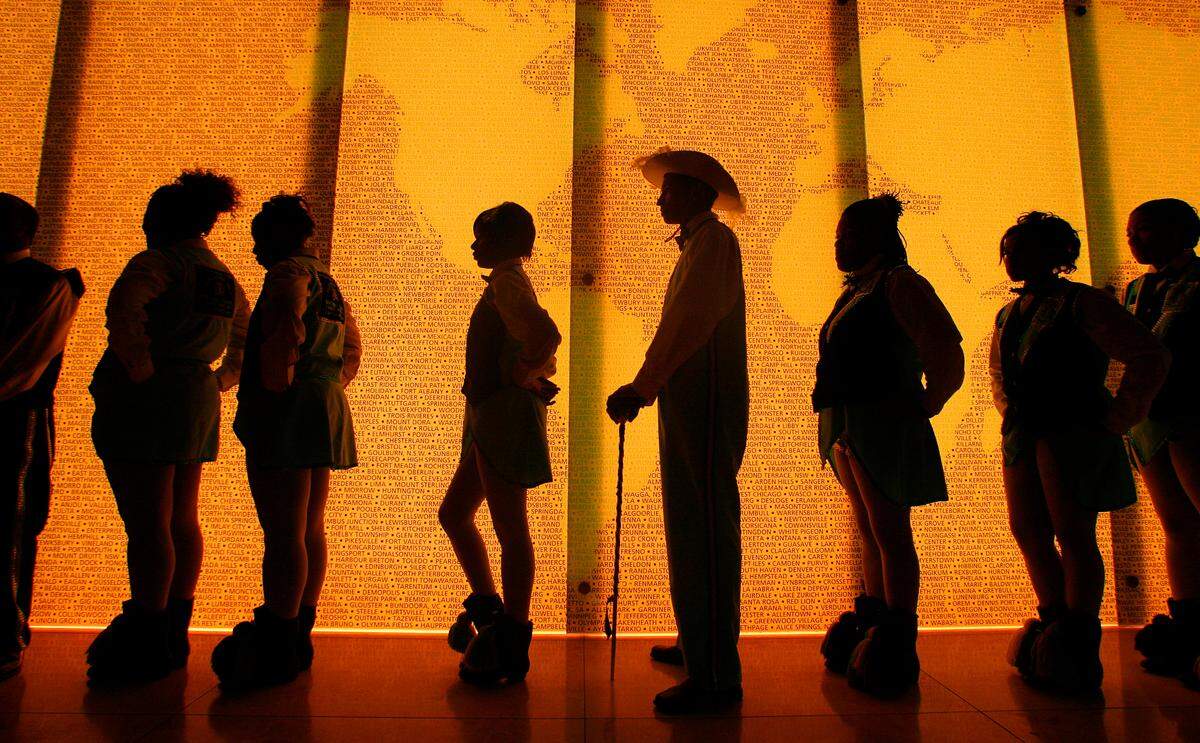On hand at H&R Block headquarters downtown were the Marching Cobras, who waited in the entryway to kick off Block’s self-proclaimed National Tax Advice Day in 2008.