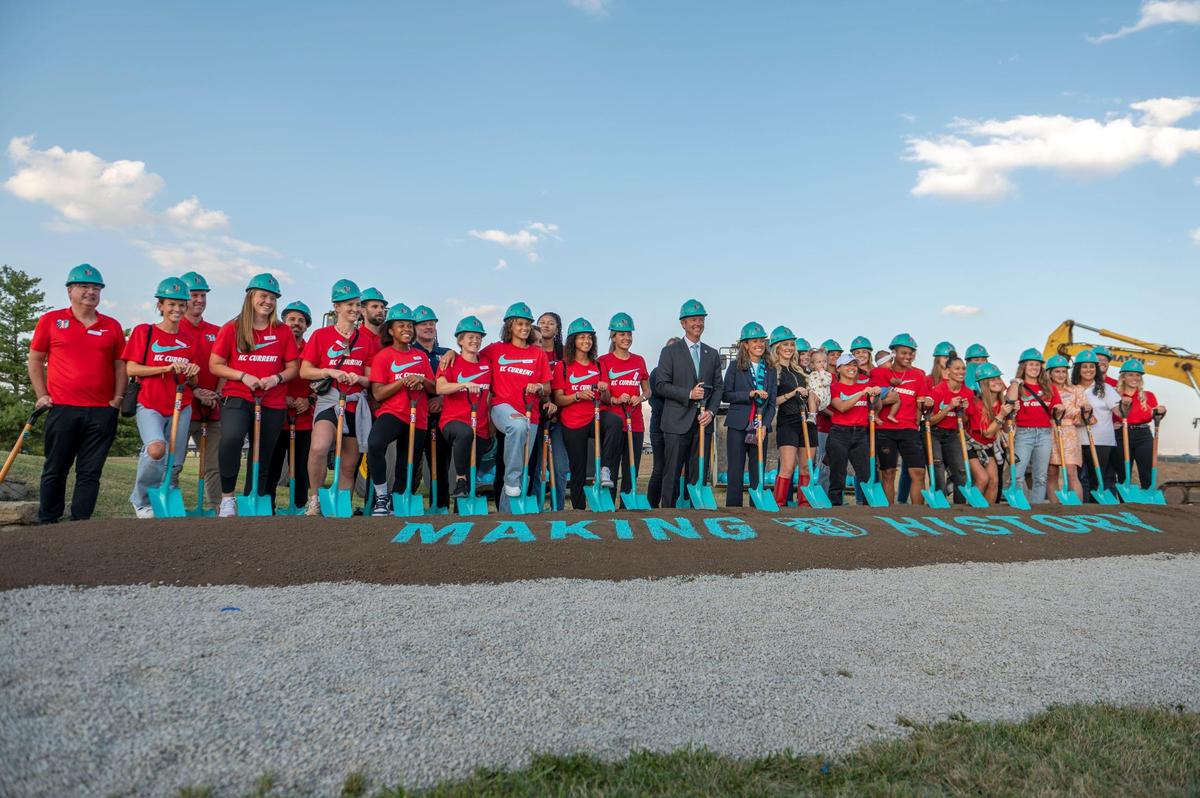 Members of the KC Current pose for a photo during the groundbreaking ceremony for the club’s new stadium at the Berkley Riverfront Park Thursday afternoon.