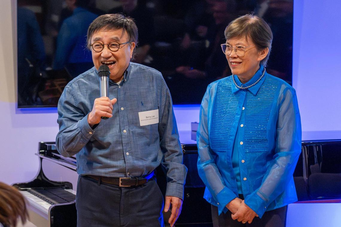 Philanthropist Benny Lee, left, and his wife Edith welcome guests to their residence for a benefit concert on Tuesday, May 27, 2025, in Kansas City.