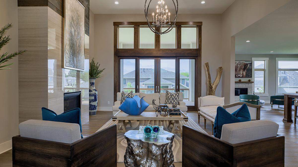 This 1.5-story floor plan has plenty of open space for gathering and entertaining, four bedrooms, five bathrooms and a spacious lower level perfect for a media, family or games room. The Cheyenne’s exterior features stone columns and captures the essence of modern living at its best.