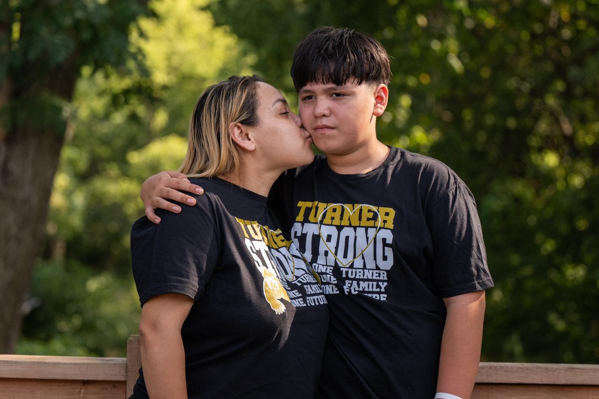 Samuel Arellano and his mother, Abigail Arellano, at their home on Aug 28. Samuel was struck by gunfire at the Chiefs Super Bowl celebration at Union Station. Samuel’s mother helped him in the early days following the shooting as Samuel struggled with nightmares and panic attacks.