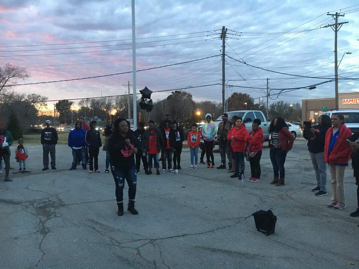 Led by KC Mothers in Charge, dozens of relatives and friends of Gerald D. Berry Jr. gathered for a vigil Tuesday, Nov. 19, 2019, across the street from where Berry was shot in the 7500 block of East 87th Street in Kansas City.