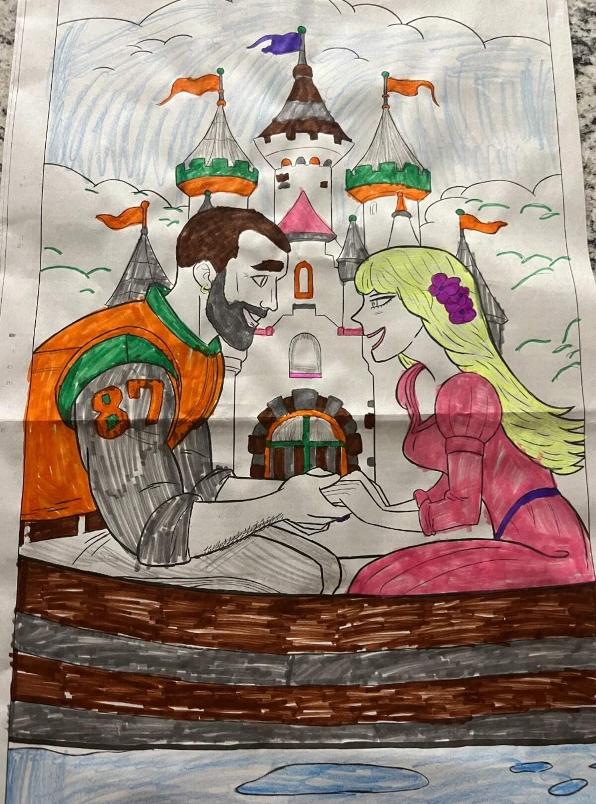 Faith Owen, age 7, of Kansas City, MO, colored Travis Kelce and Taylor Swift’s love story from Monday’s edition of The Star.