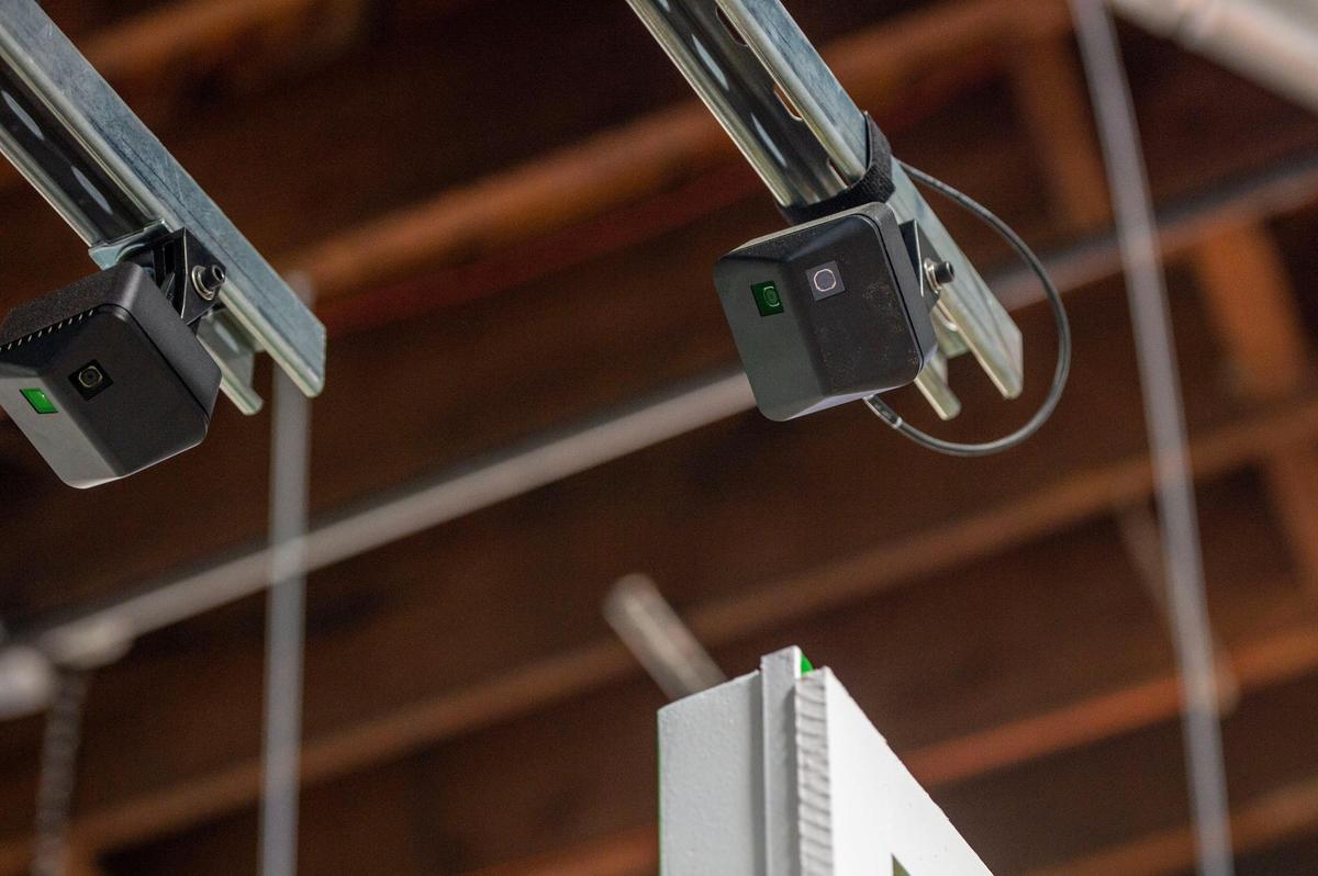 Over 100 small cameras are attached to the Community Grocers ceiling, detecting when a shopper is purchasing an item.