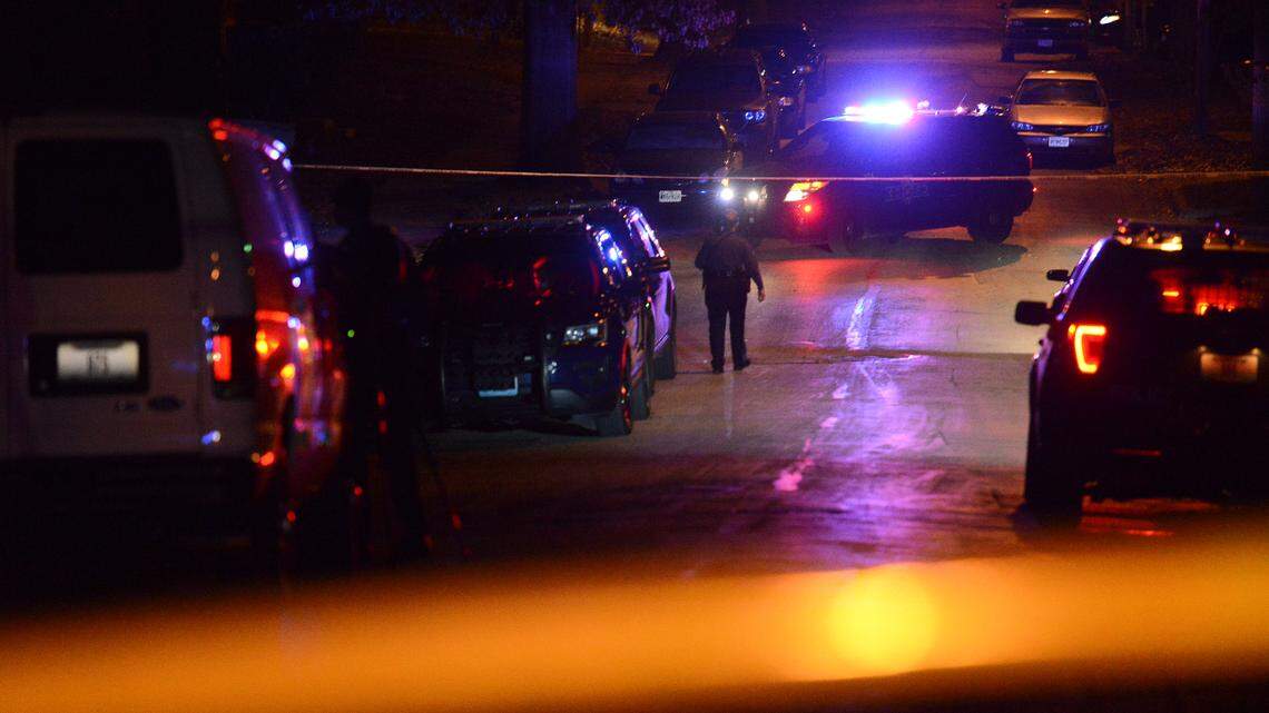 Police investigate a suspicious death Friday, Nov. 27, 2020, in the area of East 37th Street and Agnes Avenue in Kansas City.