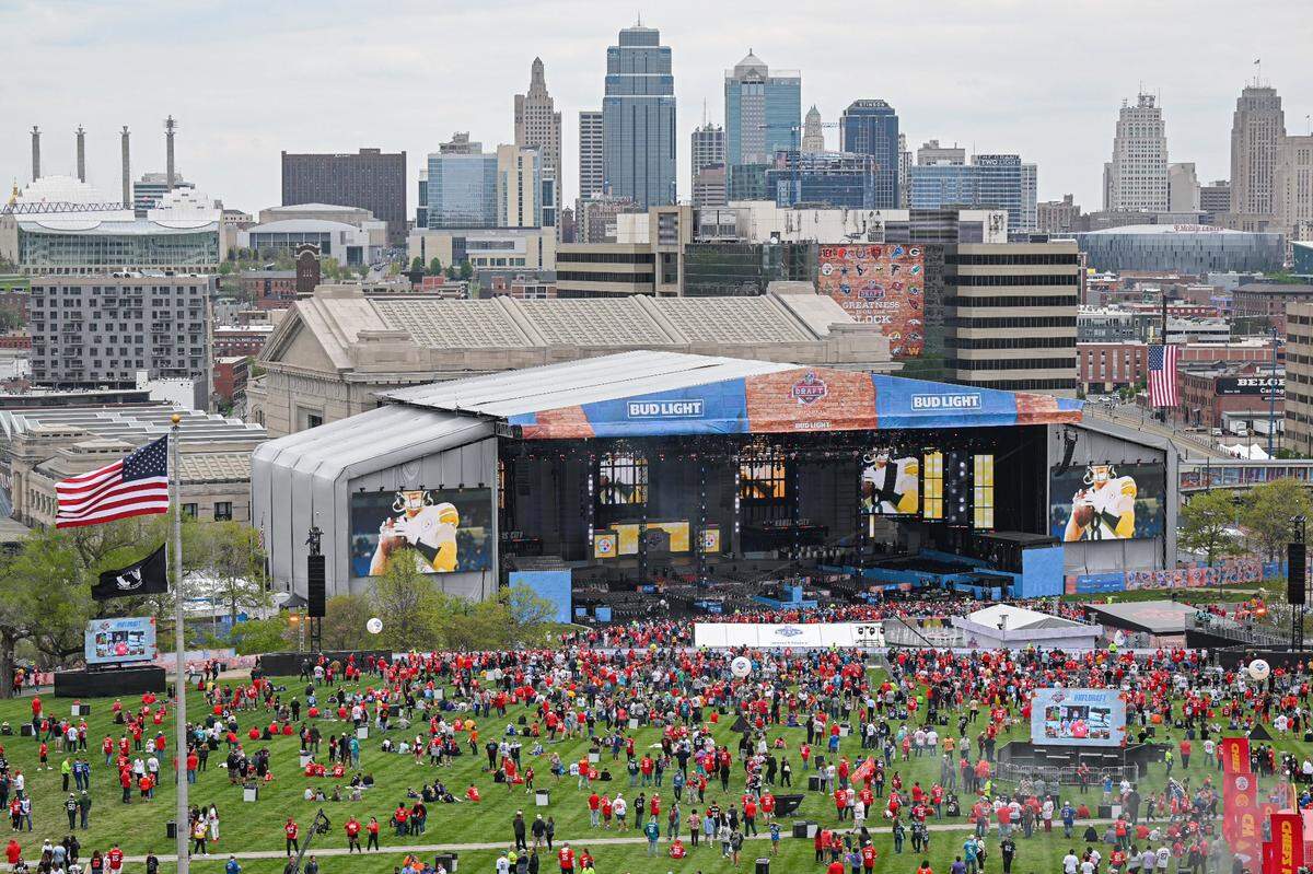 Fans gathered in front of the NFL Draft Theater stage to watch the night’s draft selections Thursday, April 27, 2023, in front of Union Station in Kansas City.