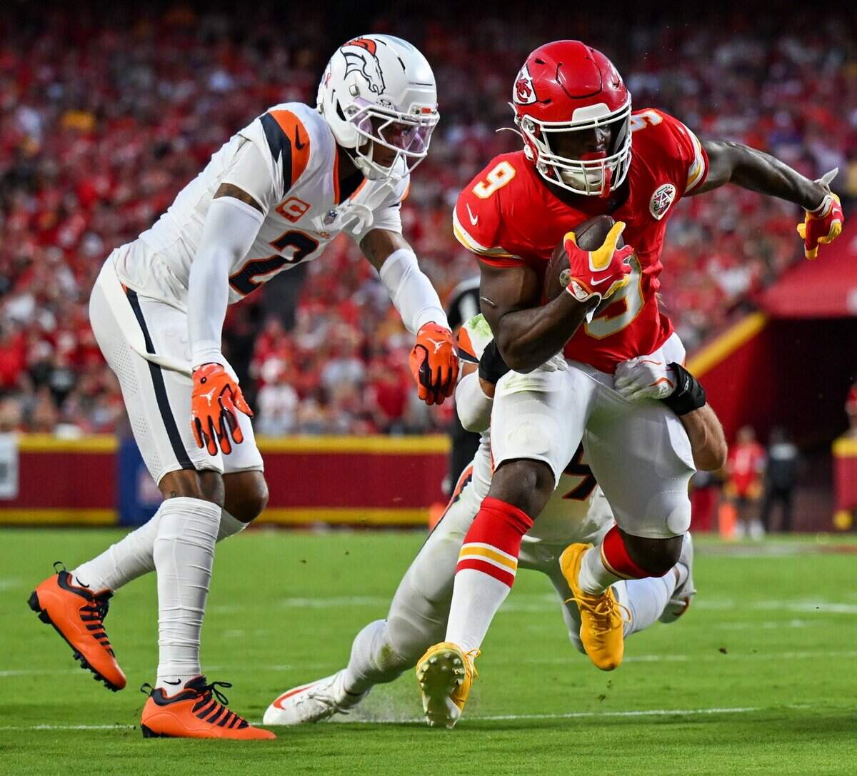 Kansas City Chiefs running back Kenneth Walker III (9) carries the ball down field in the first quarter of the Kansas City Chiefs vs. Denver Broncos NFL season opener at Arrowhead Stadium in Kansas City on Sept. 14, 2026.
