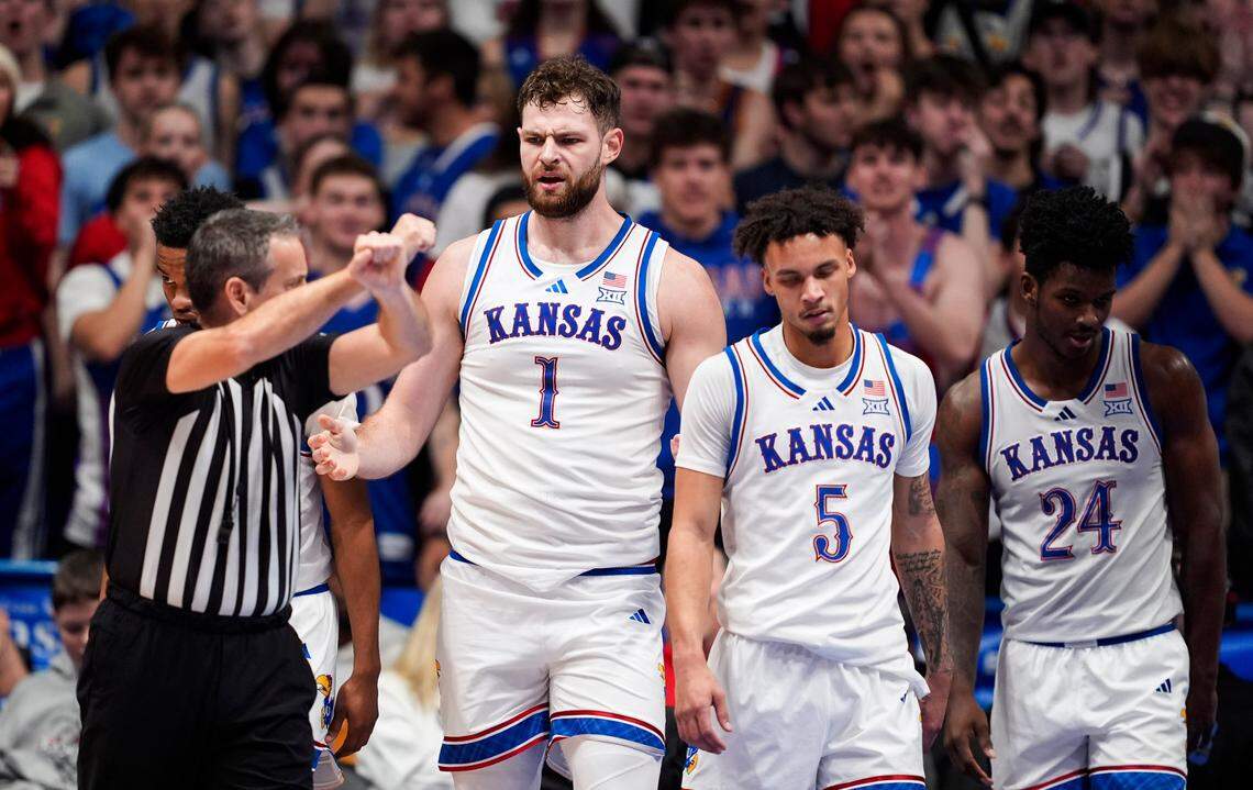 Kansas Jayhawks center Hunter Dickinson (1) reacts after a foul call during the second half against the North Carolina State Wolfpack at Allen Fieldhouse on Dec. 14, 2024.