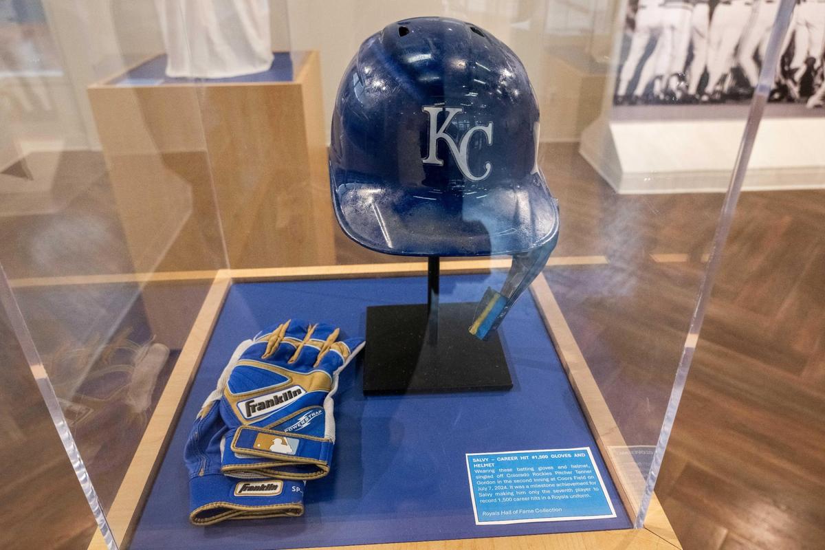 Kansas City Royals catcher Salvador Perez’s batting gloves and helmet from his 1,500 hit game is featured at the Royals’ Crowning Achievements Exhibit at Commerce Bank.