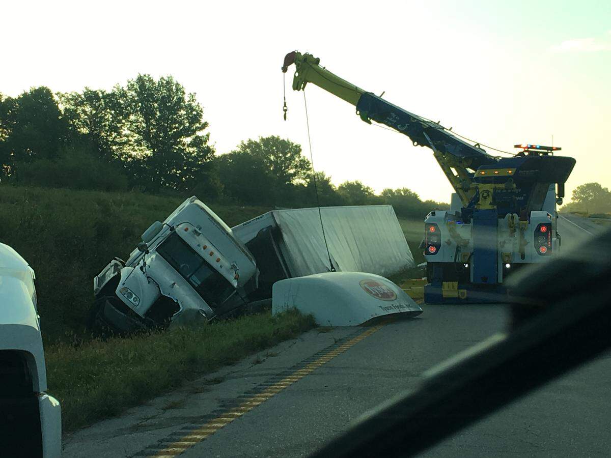 Before one of their cars were struck, Missouri State Highway Patrol troopers were investigating a crash involving a Tyson Foods tractor-trailer that had overturned in the median before 4:45 a.m. Thursday, Sept. 13, 2018, on U.S. 50 near South Noel Road.