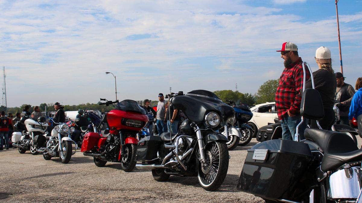 A group of motorcycles gather in a parking lot before “Tucker’s Parade” on Oct. 11, 2025. The parade honored Tucker Langford, 3, who was diagnosed with a terminal illness in August.