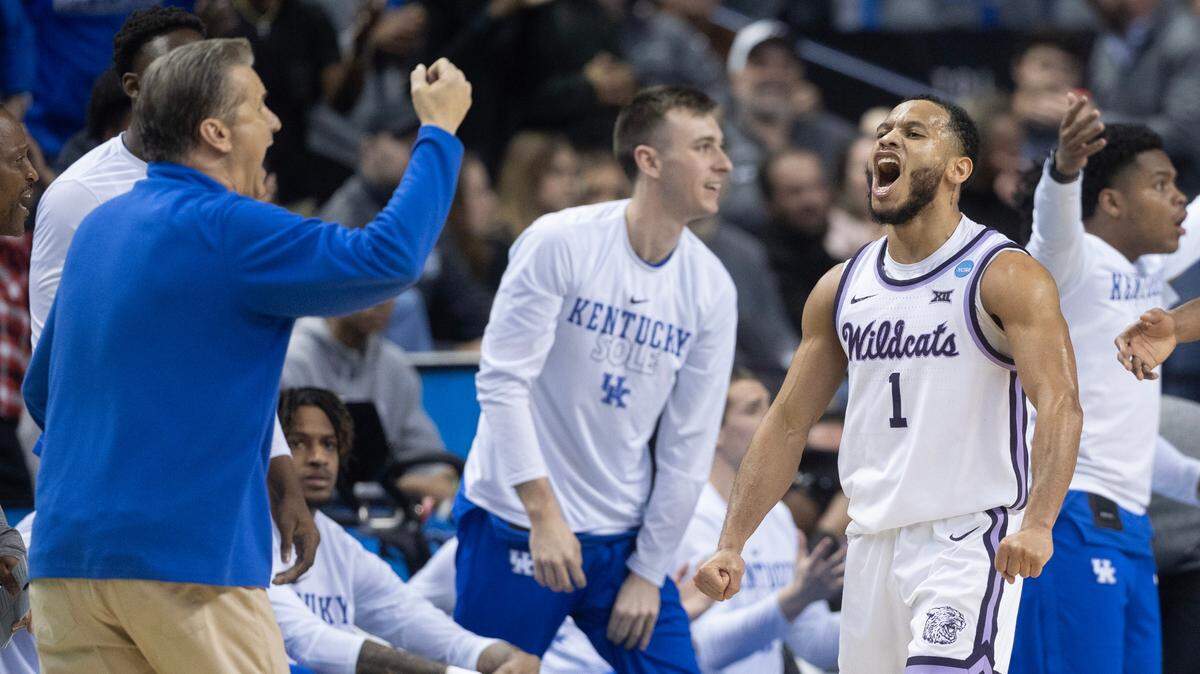 Kansas State’s Markquis Nowell lets out a yell in the direction of Kentucky coach John Calipari after hitting a three-pointer and getting a stop on the other end during a second-round NCAA Tournament game in Greensboro, N.C., on Sunday.