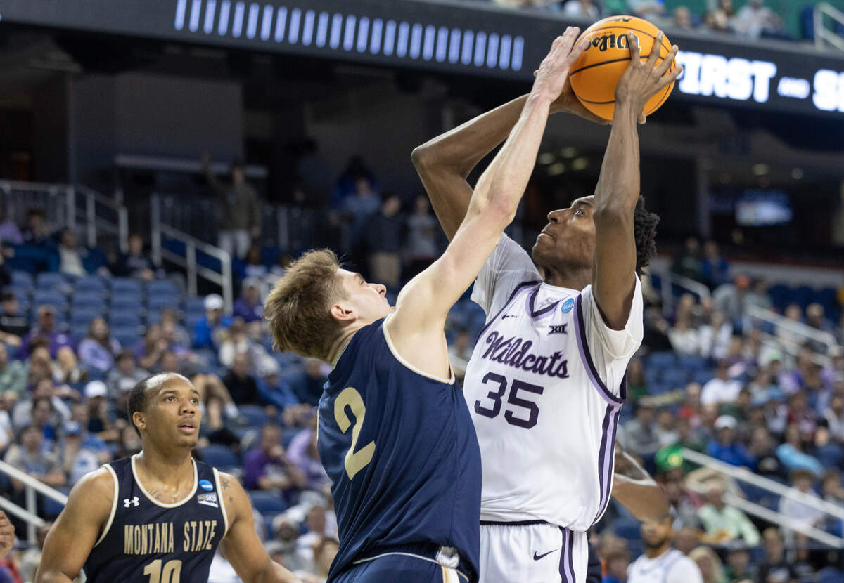 Kansas State’s Nae’Qwan Tomlin shoots over Montana State’s Nick Gazelas during the second half of their first round NCAA Tournament game in Greensboro, NC on Friday night.