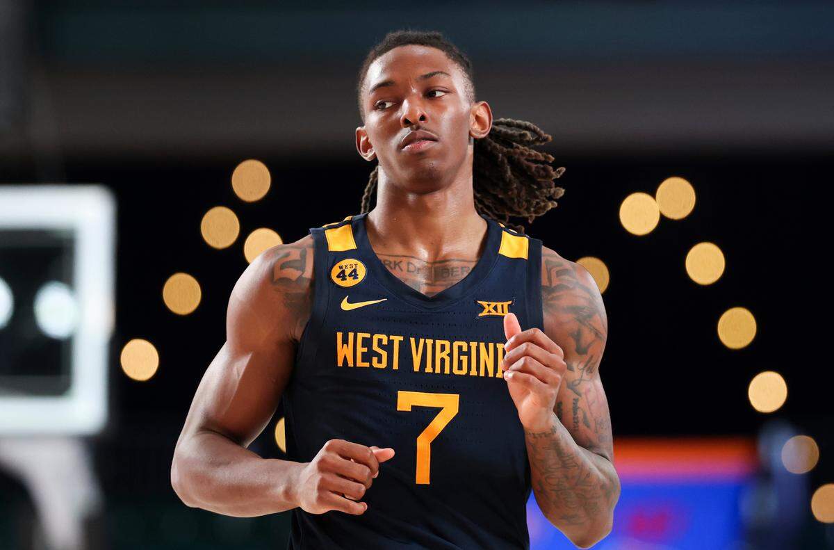 West Virginia Mountaineers guard Javon Small (7) reacts during the second half against the Louisville Cardinals at Imperial Arena at the Atlantis resort in the Bahamas on Nov. 28, 2024.