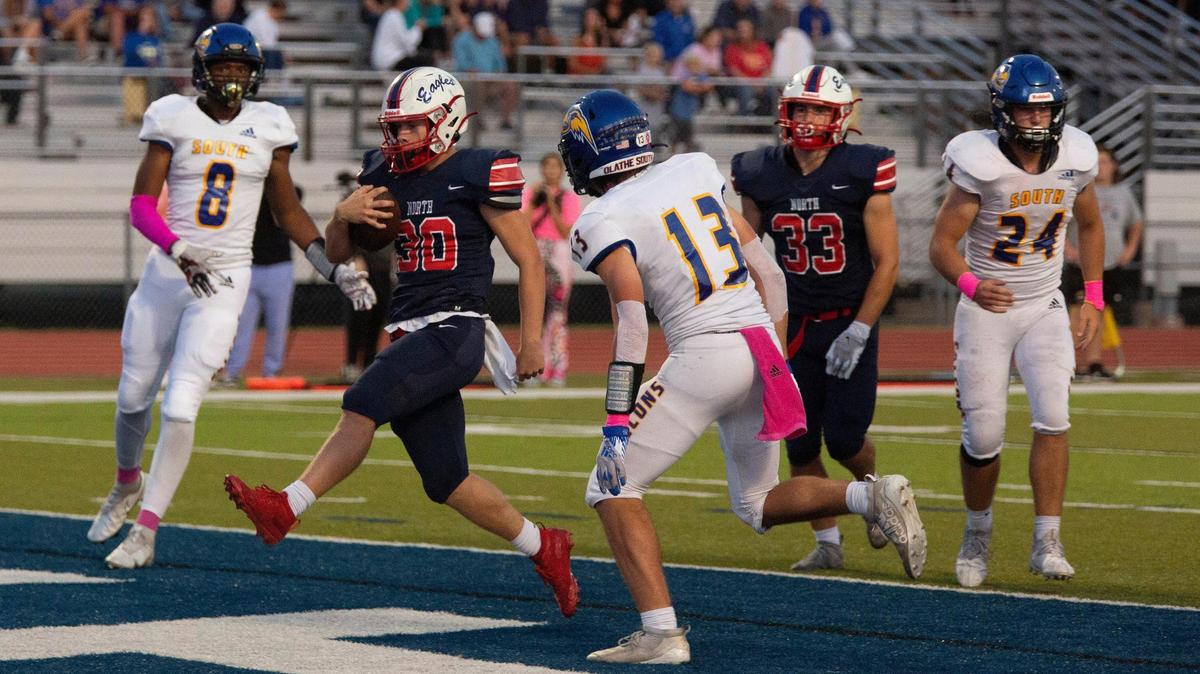 Olathe North quarterback Noah Palmer scored the first touchdown of the game against Olathe South on Friday, October 1, 2021 at the Olathe District Athletic Complex.