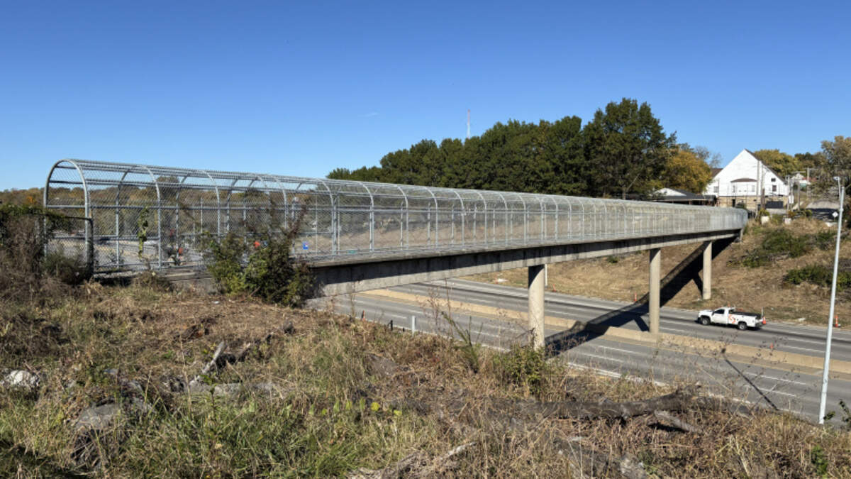 The chain-linked Oakley Avenue pedestrian walkway over I-70 will be torn down and rebuilt in 2027, alongside several mainline bridges in a stretch of highway from Prospect Avenue to Van Brunt Boulevard.