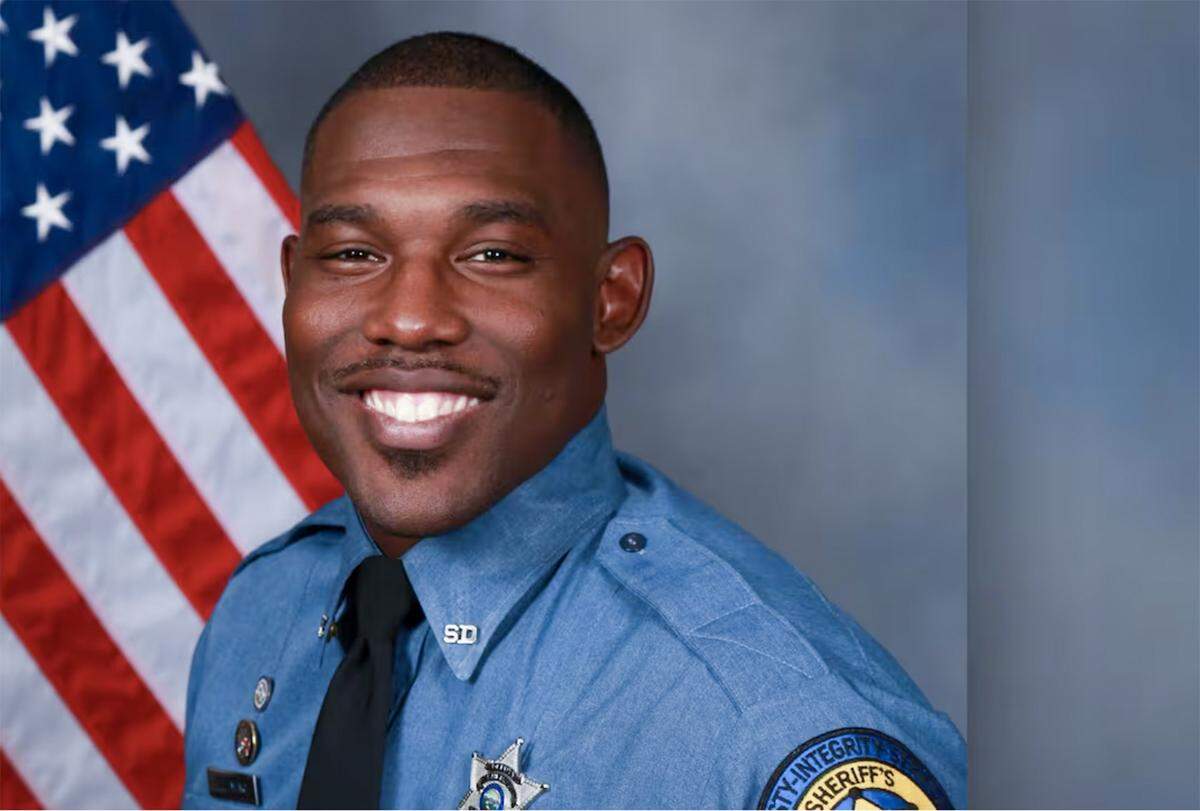 Wyandotte County Sheriff's Deputy Elijah Ming, a nearly nine-year veteran of the Sheriff's Office, died Saturday, July 26, 2025, after being shot while responding to a civil standby call in the Argentine area of Kansas City, Kansas. Ming is seen in a photo from the Wyandotte County Sheriff's Office.