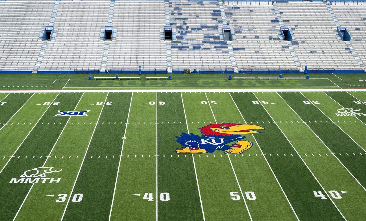 The new field was seen against the stark background of the old seats on the east side during a tour of the $450 million renovated David Booth Kansas Memorial Stadium on Tuesday, Aug. 19, 2025, at the University of Kansas in Lawrence.  