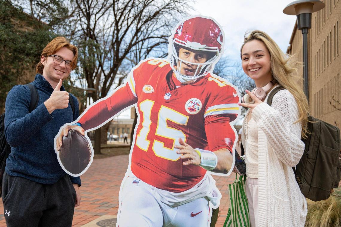 Texas Tech University students Connor Leach, left, and Bella Pettiet, pose for a photo next to a life-size cutout featuring Kansas City Chiefs quarterback Patrick Mahomes at Texas Tech University on Tuesday, Feb. 6, 2024, in Lubbock, Texas.