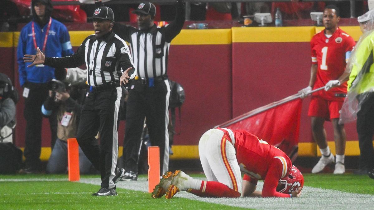 Kansas City Chiefs quarterback Patrick Mahomes (15) kneels on the sideline after injuring his ankle in the fourth quarter while playing the Tampa Bay Buccaneers on Monday, Nov. 4, 2024, at GEHA Field at Arrowhead Stadium.