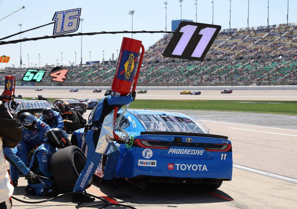 NASCAR Cup Series driver Denny Hamlin stops for fuel and tires early in the Sunday, May 11, 2025 AdventHealth 400 auto race at Kansas Speedway in Kansas City, Kan.