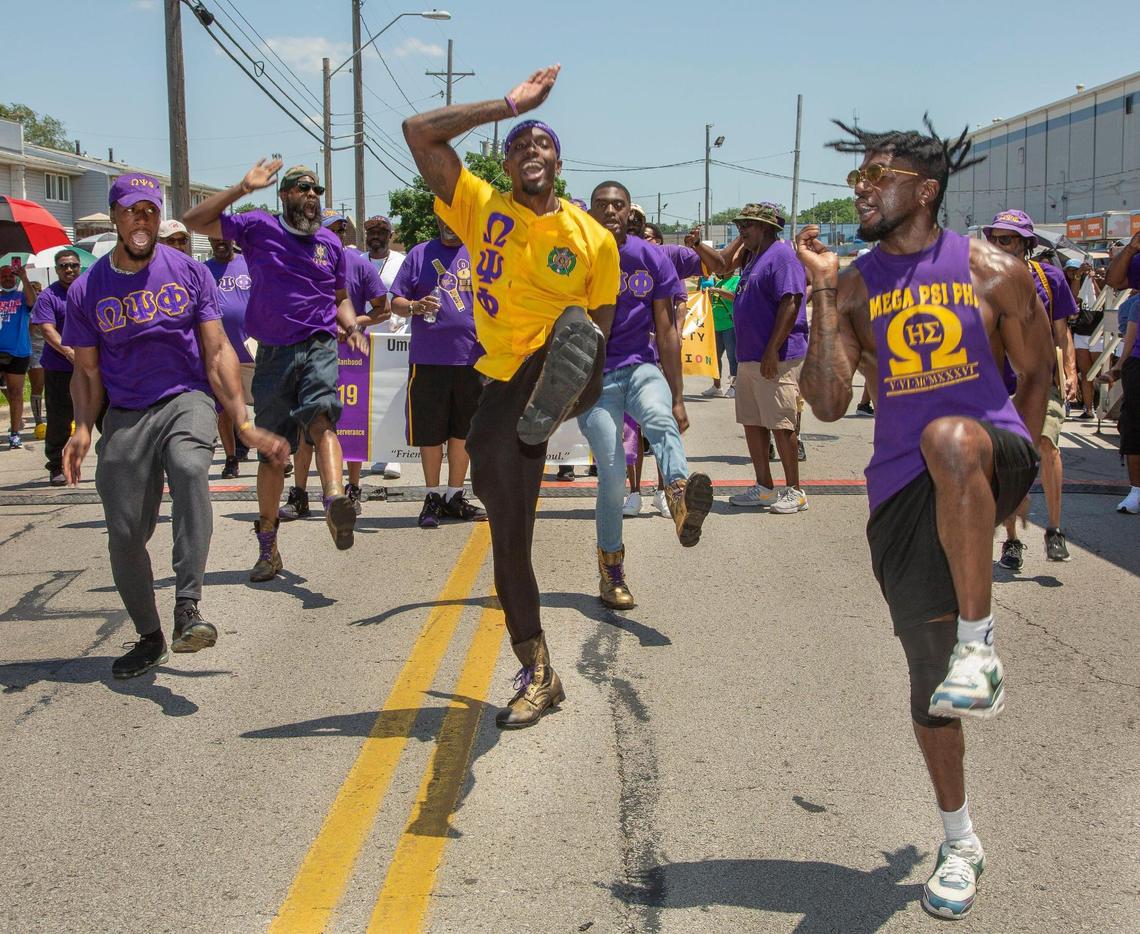 Members of the Omega Psi Phi fraternity performed a step routine in front of the judges stand at the JuneteenthKC 2021 Cultural Parade Saturday, June 12, 2021 in the Historic Jazz District near 18th and Vine.