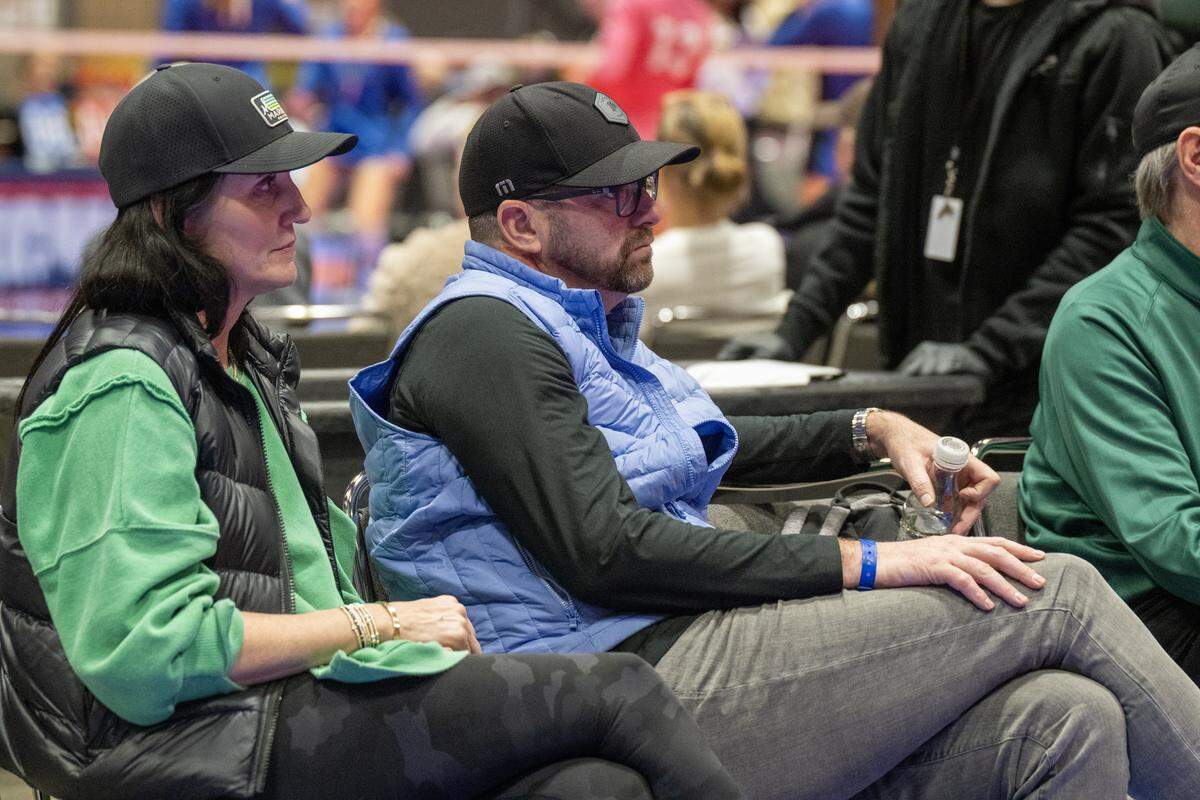 Anthony and Kristen Jackson of Texas sit on the sidelines to watch their daughter, Skylar Jackson compete with the Madfrogs Volleyball team at The&nbsp;Triple Crown NIT on Sunday, Feb. 15, at Bartle Hall at the&nbsp;Kansas City Convention Center. 