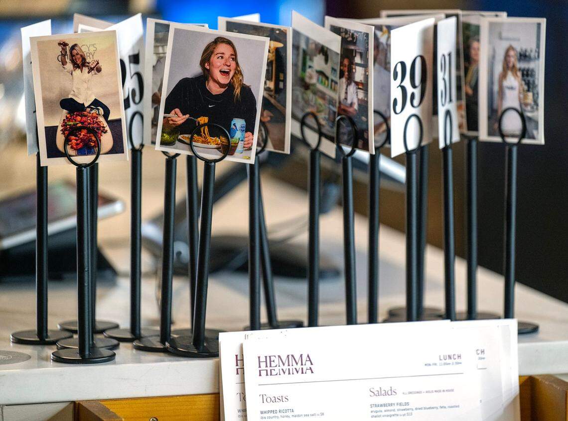 Tabletop number signs feature unique photographs at Hemma Hemma, 7122 Wornall Rd, Kansas City.