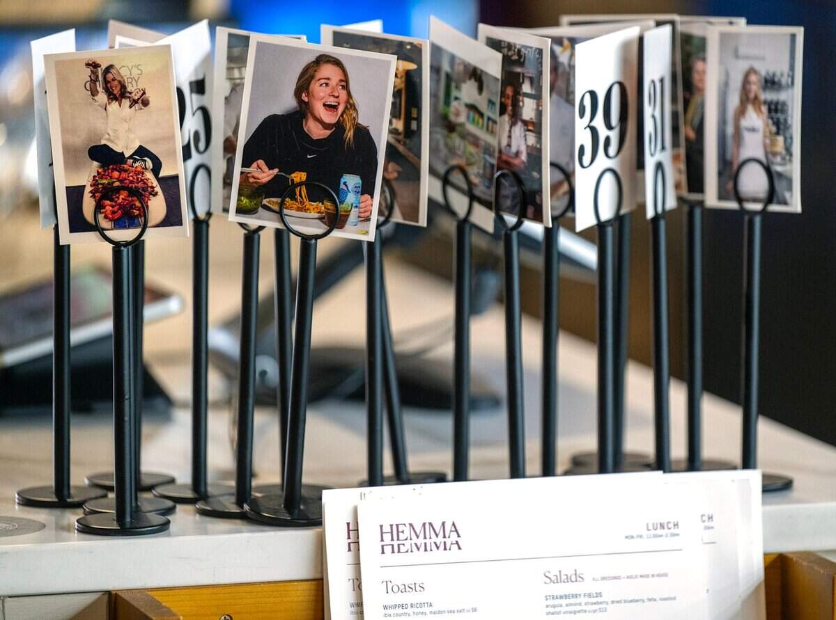 Tabletop number signs feature unique photographs at Hemma Hemma, 7122 Wornall Rd, Kansas City.