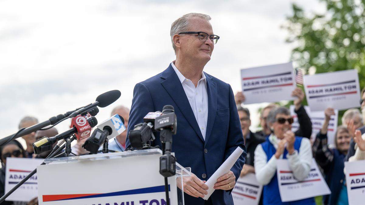 Supporters cheer after Rev. Adam Hamilton, senior pastor of the United Methodist Church of the Resurrection, delivers remarks announcing his run for U.S. Senate at Harmon Park on Thursday, April 30, 2026, in Prairie Village.
