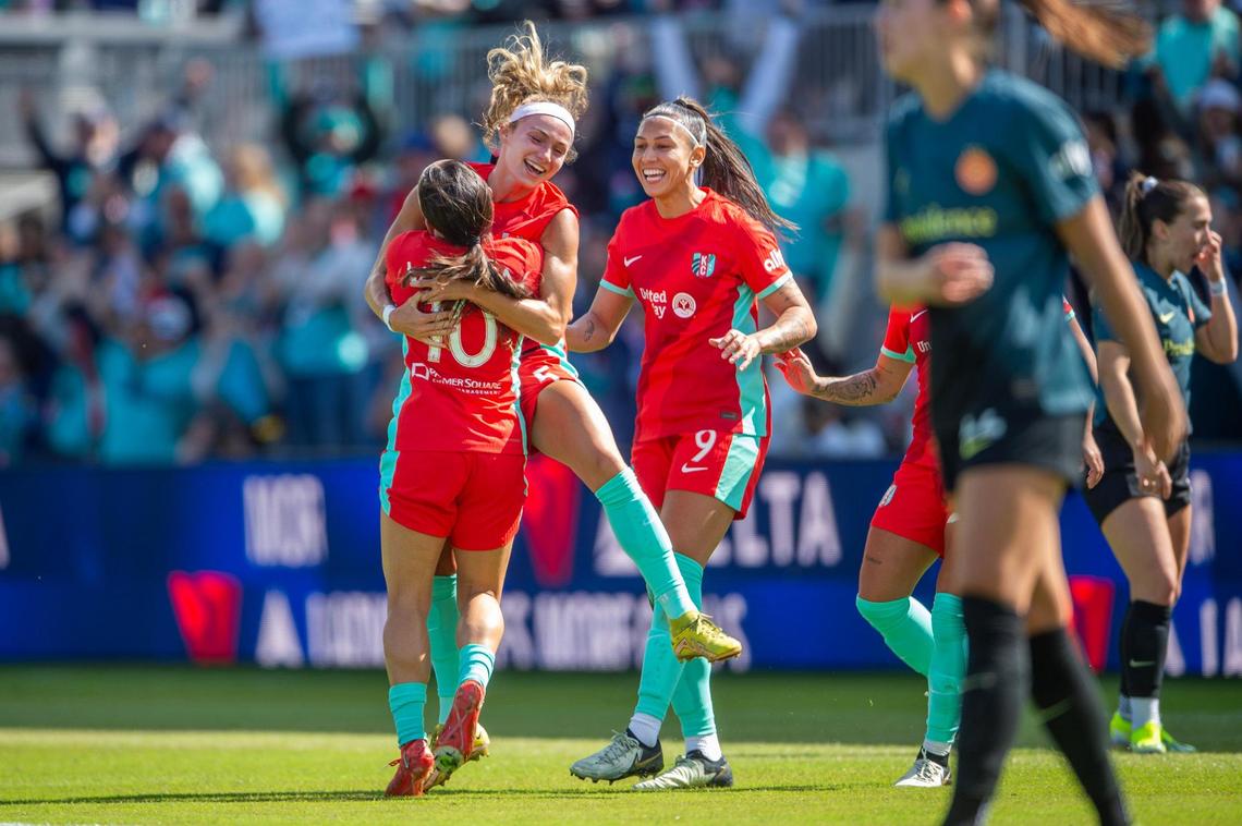 Kansas City Current teammates celebrate after defender Ellie Wheeler (5) scores a goal in the first half of an NWSL match against the Portland Thorns FC at CPKC Stadium on Saturday, March 16, 2024, in Kansas City.