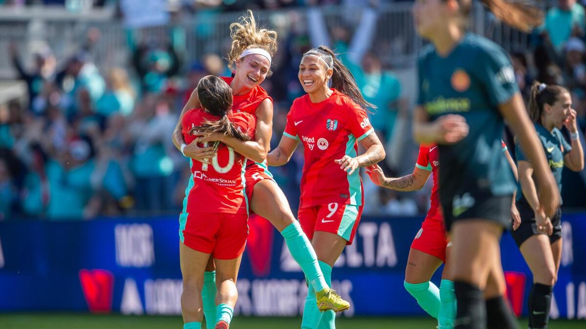 The Kansas City Current teammates celebrate after defender Ellie Wheeler (5) scores a goal in the first half of an NWSL match against the Portland Thorns FC at CPKC Stadium on Saturday, March 16, 2024, in Kansas City.