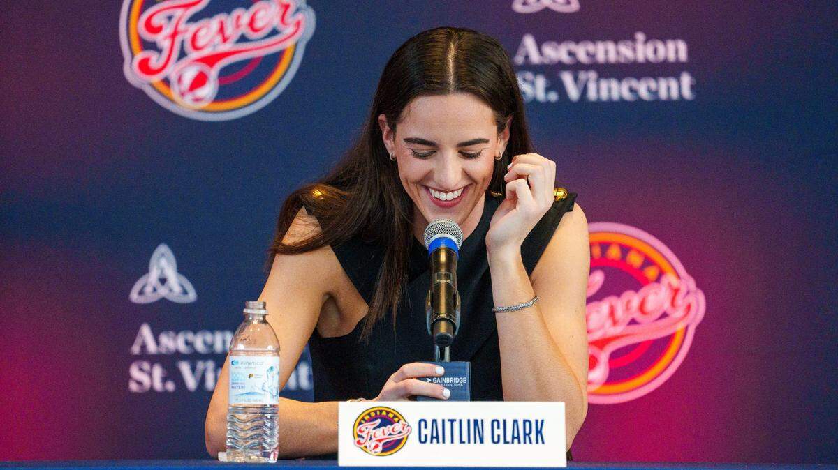 Indiana Fever star Caitlin Clark, a former Iowa Hawkeyes standout and the No. 1 pick in the 2024 WNBA Draft, speaks Wednesday, April 17, 2024, during an introductory press conference inside the entry pavilion at Gainbridge Fieldhouse.