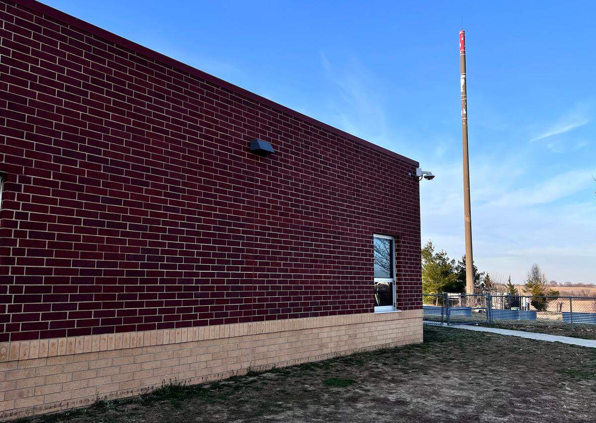Warren Hills Elementary School in Liberty. A cellular antenna stands very close to the school building.