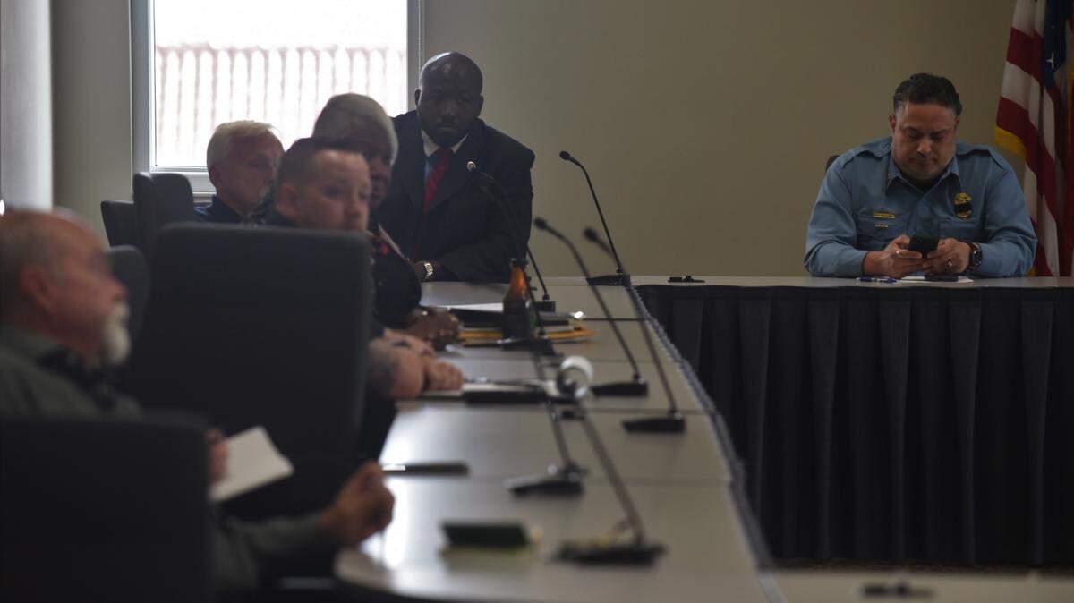 Wyandotte County District Attorney Mark Dupree, center, listens during a public comment portion of a Wyandotte County law enforcement advisory committee meeting on the case of Amaree’ya Henderson, a 25-year-old man shot and killed by a Kansas City, Kansas, police officer on April 26.
