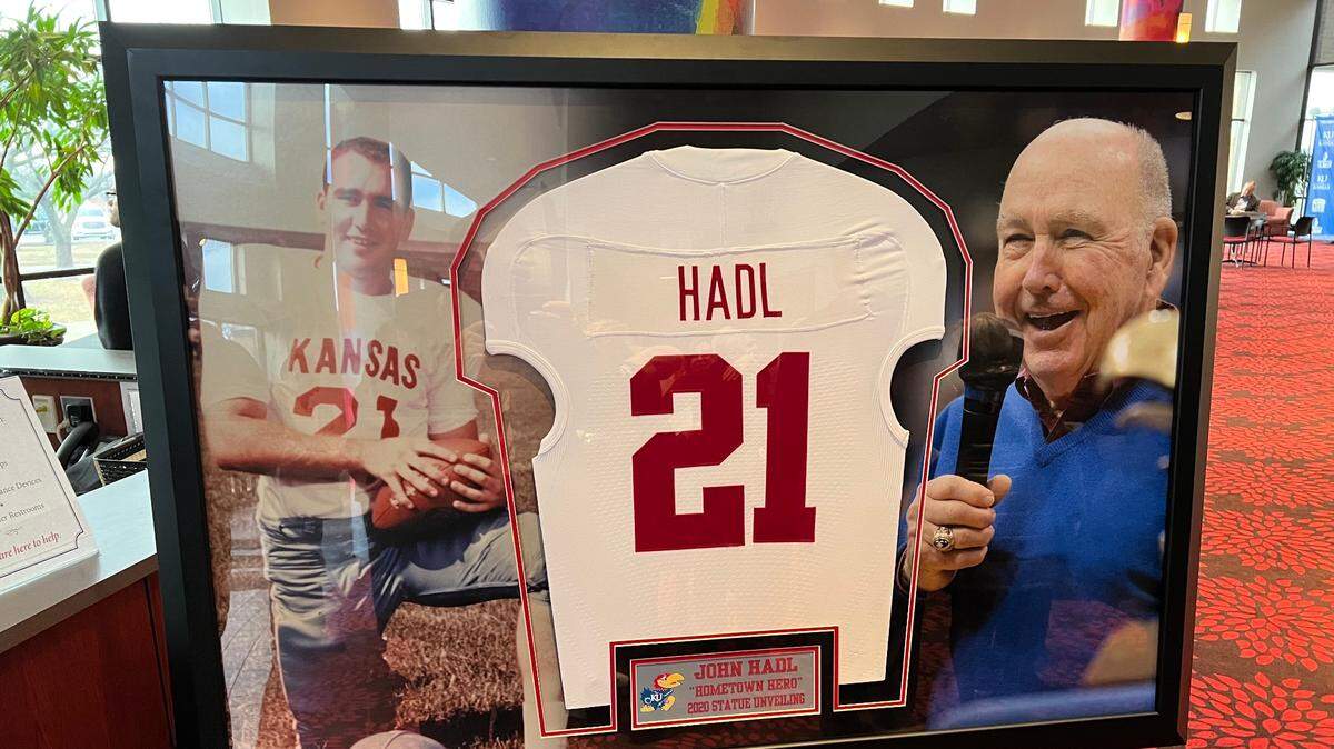 Pictures of John Hadl and his jersey were placed in a frame and on display at John Hadl’s celebration of life Friday at Lied Center on KU’s West campus.