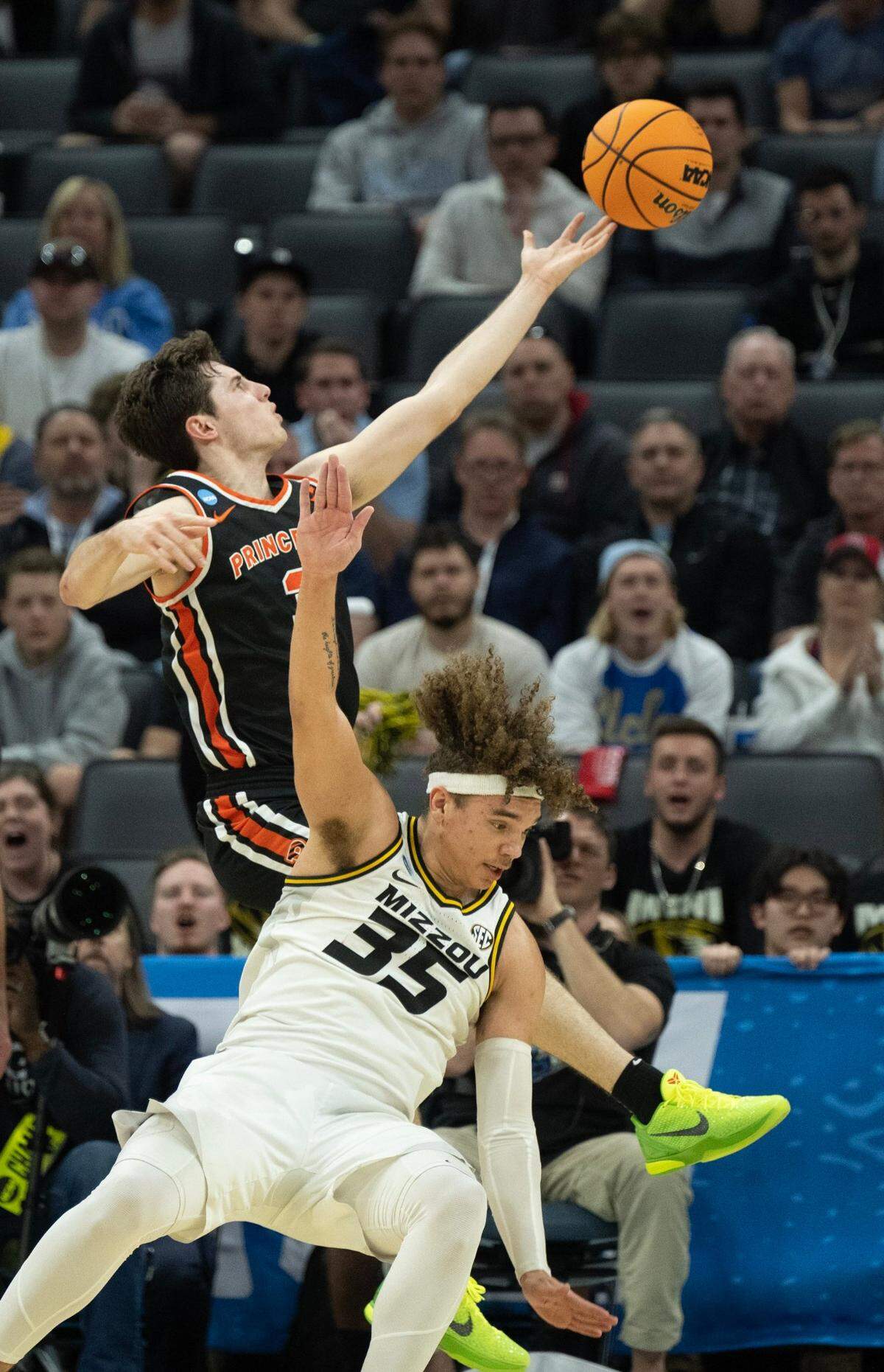 Princeton Tigers guard Ryan Langborg (3) drive past Missouri Tigers forward Noah Carter (35) for a basket during a game in the NCAA Tournament at Golden 1 Center in Sacramento, Saturday, March 18, 2023.