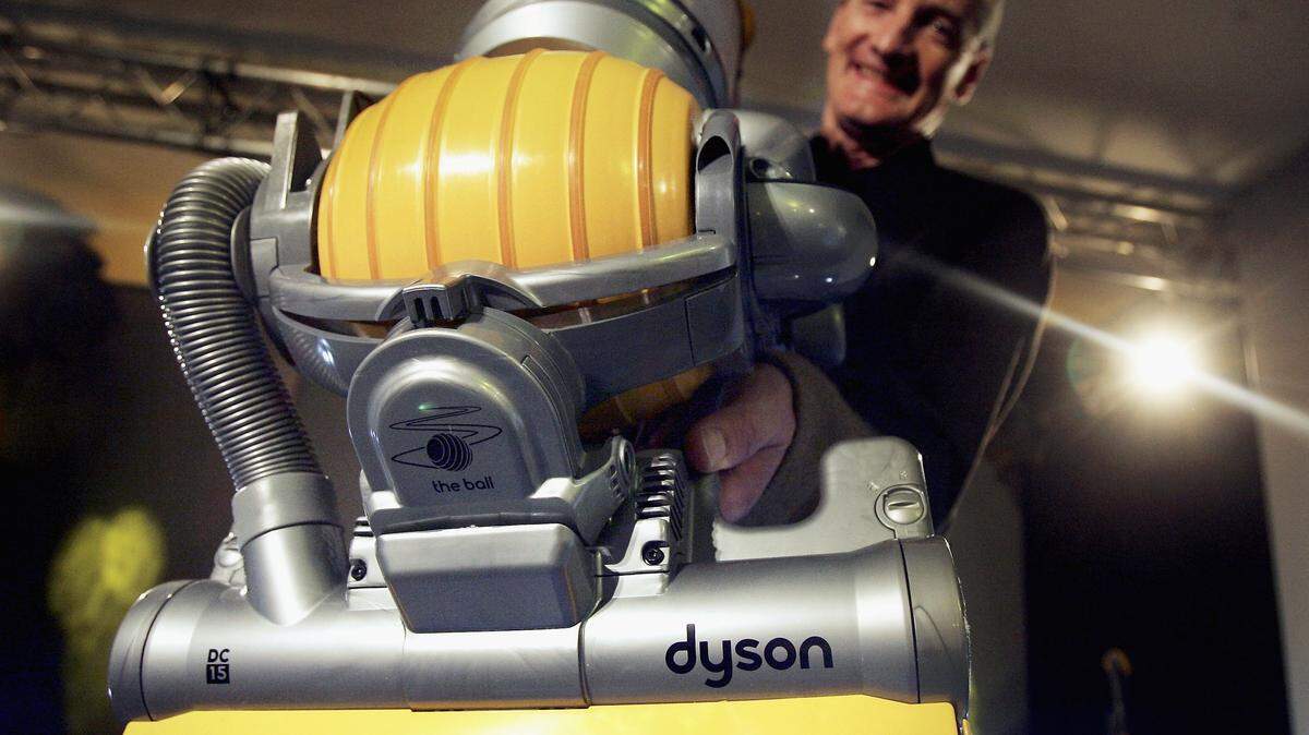 a man vacuuming.