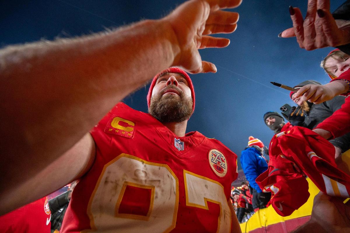 Kansas City Chiefs tight end Travis Kelce (87) greets fans after the Chiefs’ 23-14 victory against the Houston Texans in the AFC Divisional Round playoff game on Saturday, Jan. 18, 2025, at GEHA Field at Arrowhead Stadium.