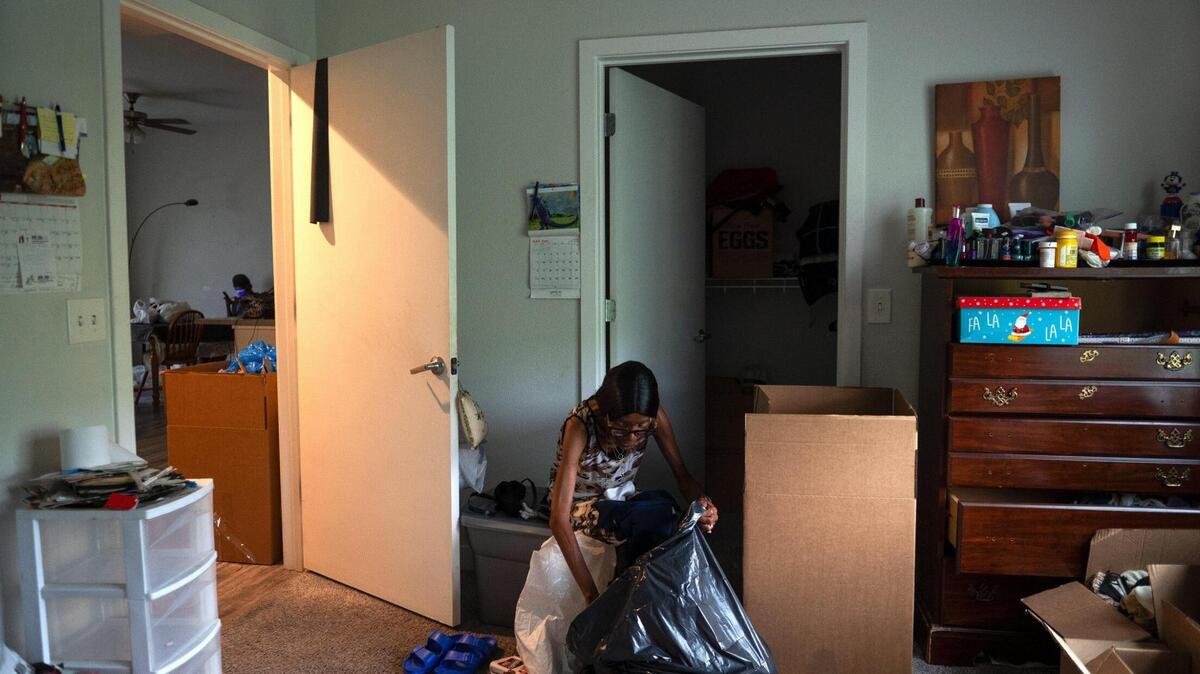 Vivian Jackson packs her belongings into boxes and bags on Thursday, Aug. 3, 2023, at the Emanuel Cleaver II Senior Living Community in Kansas City. Jackson is now at risk of being homeless after being kicked out of the senior living community after being accused of excessive partying.